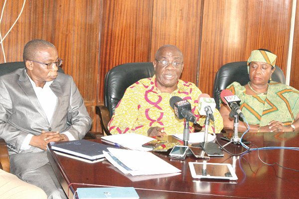  Mr Samson K. Boafo (middle), the Board Chairman of the Mineral Commission, briefing the media during the meeting. Picture: INNOCENT K. OWUSU
