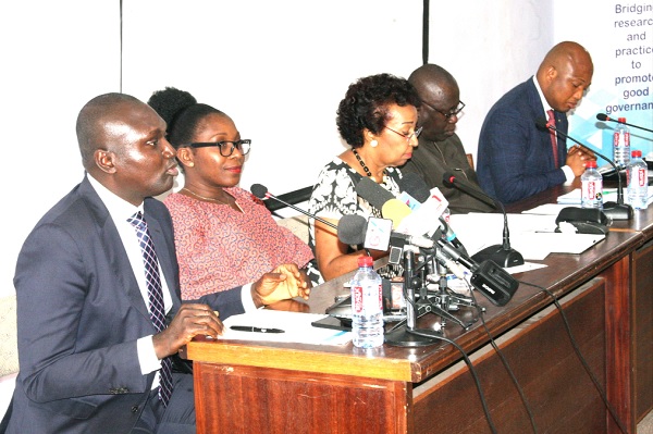 Mr Charles Owiredu (left), Deputy Minister of Foreign Affairs and Regional Integration, speaking during the Assessment of President  Akufo-Addo's one year in office. with him are Dr Amanda Coffie (2nd left), Ambassador Francis Tsegah (middle), Dr Emmanuel Kwesi Aning (2nd right) and Mr Samuel Okudzeto Ablakwa (right)