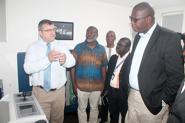  Mr John Haakestad (left), trainer, Ghana Marine Training Centre, interacting with Mr Nuertey Adzeman (2nd left), Local Content Committee Member, Mr Seth Nii Dowuona Owoo (back), Managing Director of Swire Adonai Services Limited, and Mr Egbert Faibille (right). Picture: Maxwell Ocloo