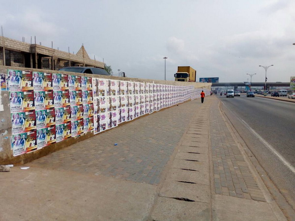 Unpermitted promotional materials plastered on the Mallam Interchange