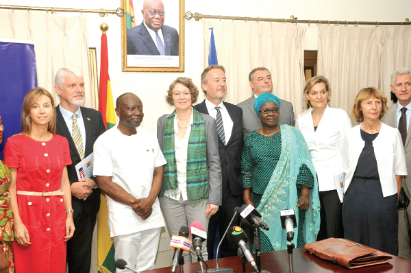 Mr Ken Ofori-Atta with members of the EU delegation after the signing ceremony