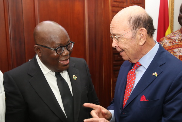President Akufo-Addo interacting with Mr Wilbur Ross (right), United State Secretary of Commerce after the MOU at the Jubilee House in Accra. 
