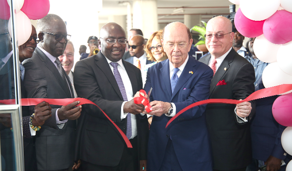 Vice-President Mahamudu Bawumia (2nd left) jointly cutting the tape with Mr Wilbur Ross (2nd right), United State Secretary of Commerce and Mr Robert Jackson (right), US Ambassador to Ghana. Picture by SAMUEL TEI ADANO