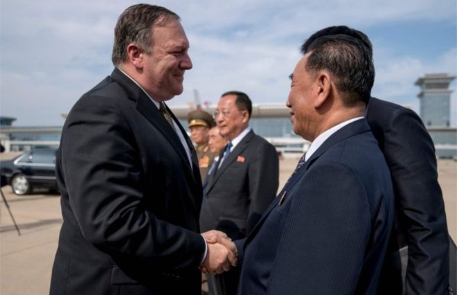 Mike Pompeo and Kim Yong-chol say goodbye as the US envoy departs for Japan