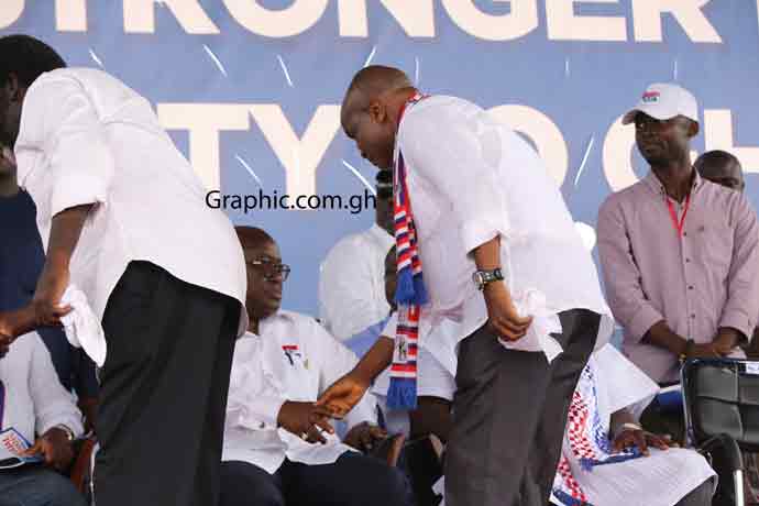 Stephen Ntim in a handshake with President Akufo-Addo