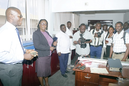 Mr Vincent Arthur (left) Head of Engineering Department of the Ghana Standards Authority, briefing journalists on some substandard electrical cables. Picture: GABRIEL AHIABOR
