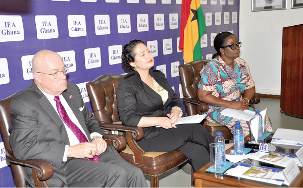 Ms Cristina M. Villegas (middle) flanked by the US Ambassador to Ghana, Mr Robert Jackson (left), and Executive Director of ABANTU, Ms Rose Mensah Kutin, at the forum