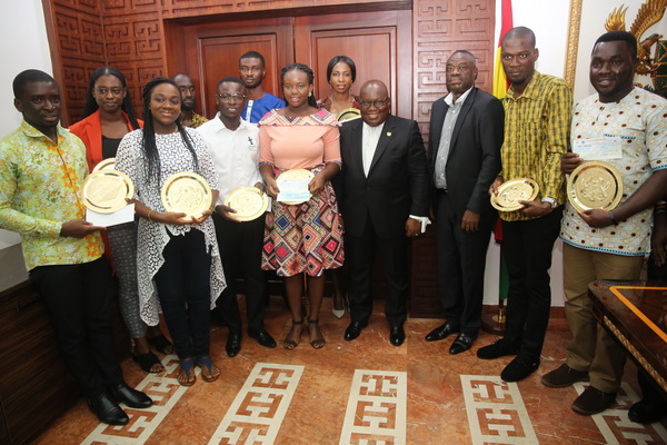 President Akufo-Addo with some of the winners after the ceremony at the Jubilee House in Accra. In the picture is Dr Mohammed Ibrahim Awal, Minister of Business Development. Picture by Samuel Tei Adano.