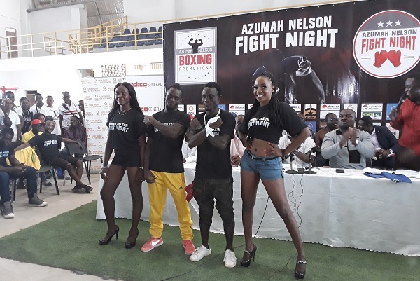 Headline fighters Abraham Osei Bonsu (2nd right) and Patrick Ayi flanked by models at yesterday's press briefing.