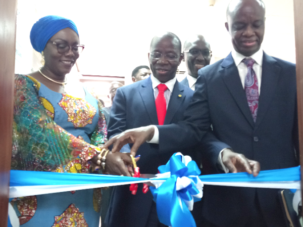 Mrs Ursula Owusu-Ekuful cutting the tape together with Mr Brahima Sanou (middle), the Director of the Telecommunication Development Bureau at the ITU, and Mr Joe Anokye (right), the Director General of NCA 