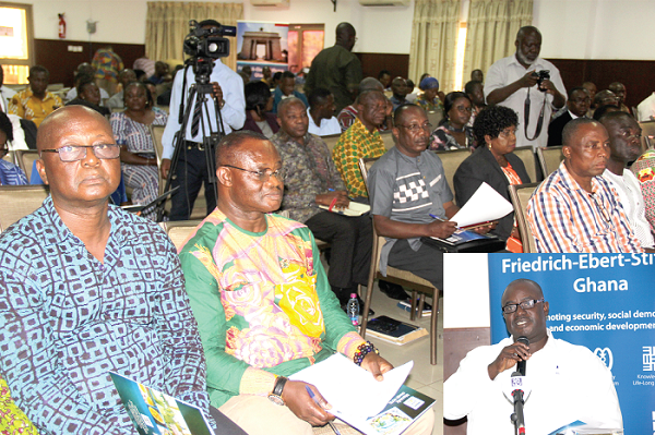 Mr Ofosu Asamoah (right), the Executive Secretary of the National Labour Commission (NLC) addressing participants in the forum. Pictures: EDNA ADU-SERWAA