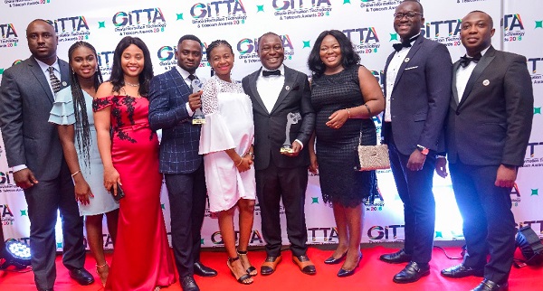 The Vokacom team displaying their awards after the 2018 edition of the Ghana Information Technology and Telecom Awards.