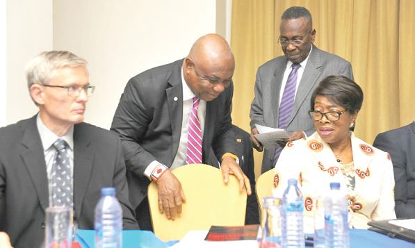 Chief Justice Sophia Akuffo (4th left) interacting with Justice Jones Dotse (2nd left), a Supreme Court judge, at the forum. With them are Mr Peter Eilschow Olesen (left), Deputy Head of Mission of the Royal Danish Embassy, and Justice S. A. Brobbey, a retired Justice of the Supreme Court. Picture: EMMANUEL QUAYE