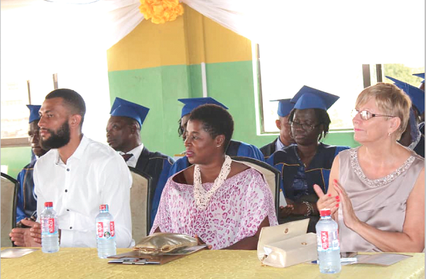  Mrs Prince-Boateng (right) applauding a performance by the graduands. With her are Mrs Letitia Ohene-Effah and Mr Macolm Prince-Boateng.  