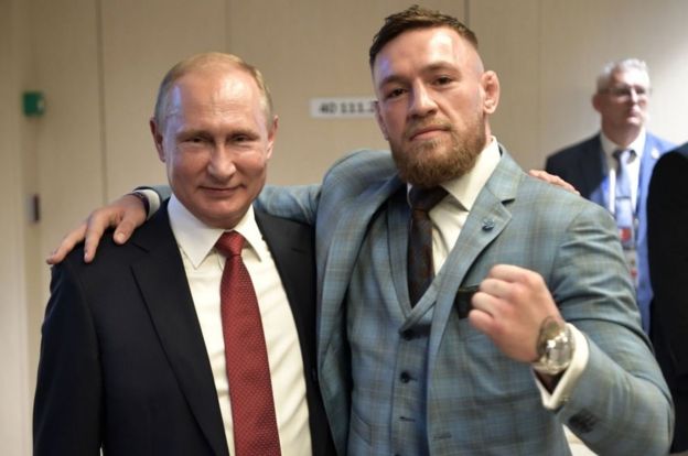 Conor McGregor, right, pictured with Russia President Vladimir Putin during the World Cup