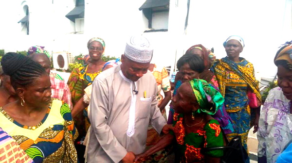 Alhaji Boniface interacting with some of the beneficiaries