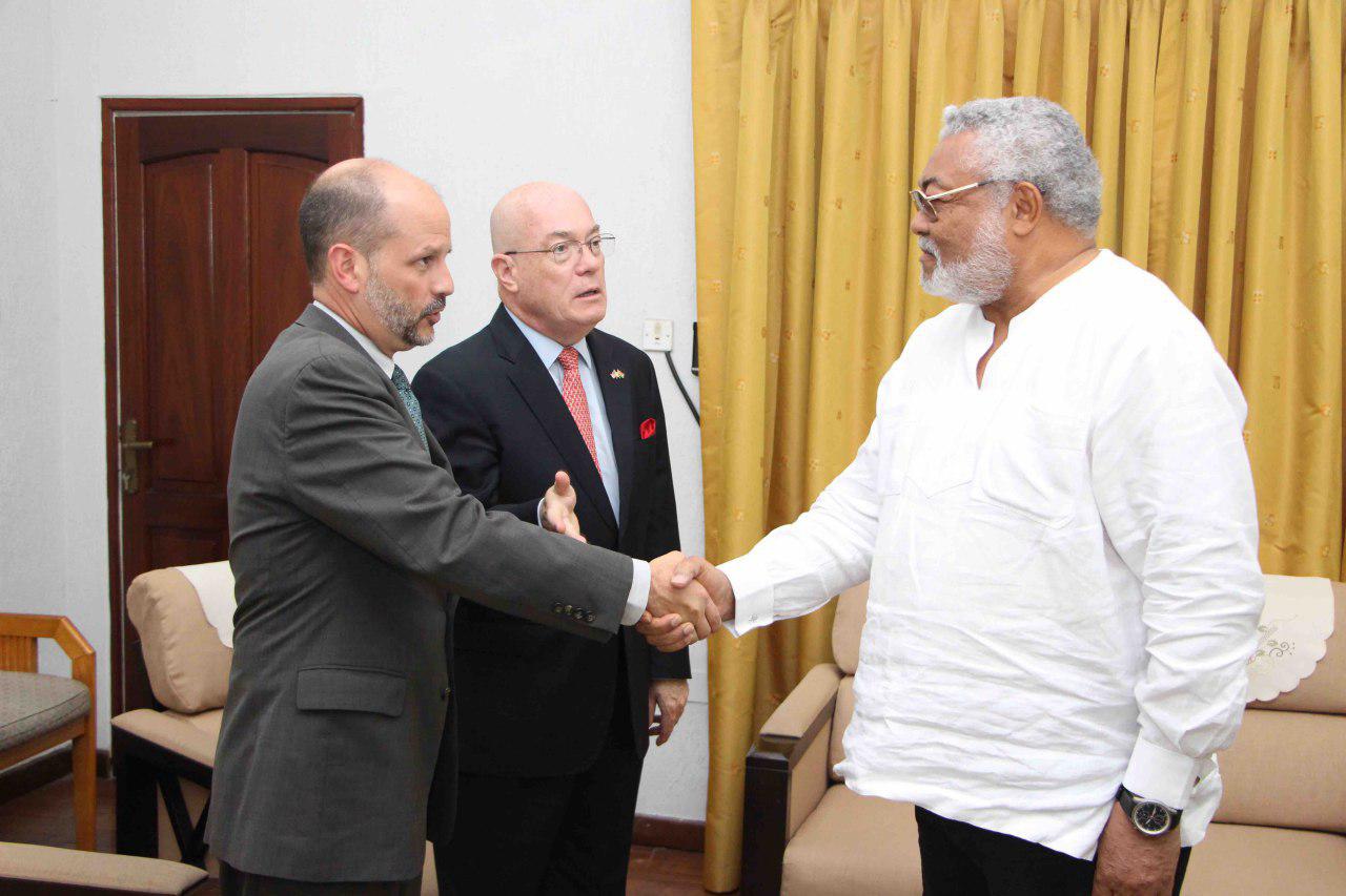Ambassador Jackson introducing the incoming Deputy Head of Mission, Mr Christopher Lamora to former President Rawlings