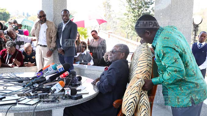 Mr Mugabe addressing the press conference