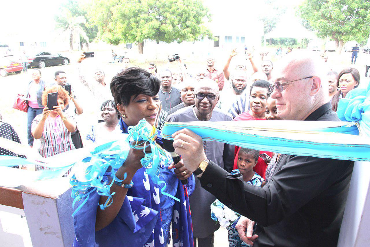 Ms Otiko Afisah Djaba (left), Minister of Gender, Children and Social Protection being supported by Mr Robbert Jackson, the outgoing US Ambassador to Ghana to cut a ribbon as a sign of re-opening of the shelter.  Picture by: BENEDICT OBUOBI