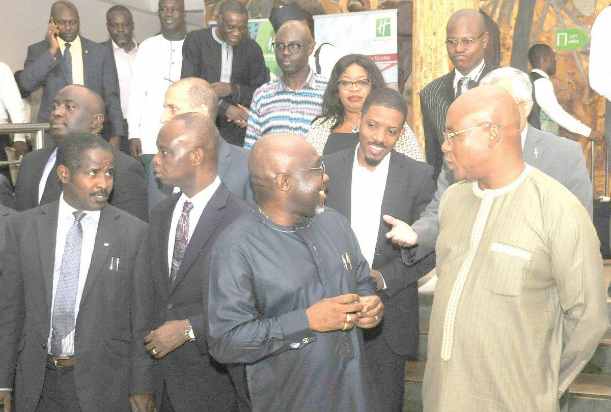 Mr George Andah (middle) a Deputy Minister of Communications, interacting with some participants after the opening ceremony of the 2nd ECOWAS World Radiocommunications Conference in Accra. Among them is Mr Joe Anokye, the Director General of National Communications Authority (NCA) and Mr Elhadi Maman Laminou (right) the Executive Secretary of WATRA. Picture: EBOW HANSON