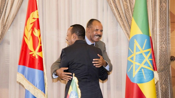 Ethiopia's prime minister Abiy Ahmed and Eritrean president Isaias Afwerk embrace at the declaration signing in Asmara, Eritrea July 9, 2018