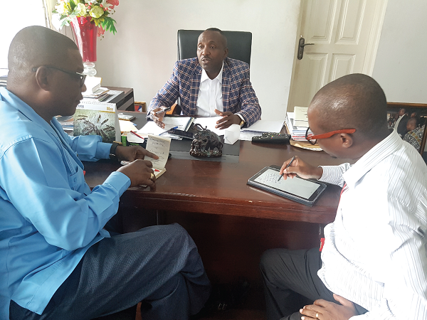  The acting General Secretary of the NPP, Mr John Boadu, speaking to the Daily Graphic’s Political Editor, Mr Kobby Asmah (left) and Victor Kwawukume
