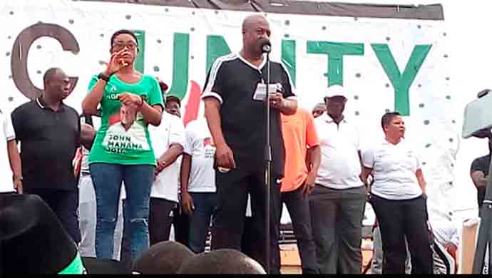 Former President Mahama addressing NDC supporters at Aflao in the Volta Region.