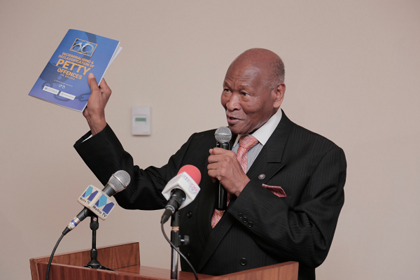 Mr Sam Okudzeto, Council of State member, launching the research report on decriminalisation and declassification of petty offences in Ghana held in Accra.