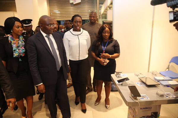 Vice-President Mahamudu Bawumia inspecting some products on display at the Mobex Africa ICT Expo at the Accra Mall. Picture: SAMUEL TEI ADANO