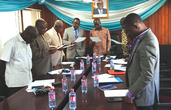 Mr Francis Kingsley Ato Codjoe, Deputy Minister, sweearing in members of the committee