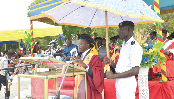 Dr James Kollie addressing the congregation