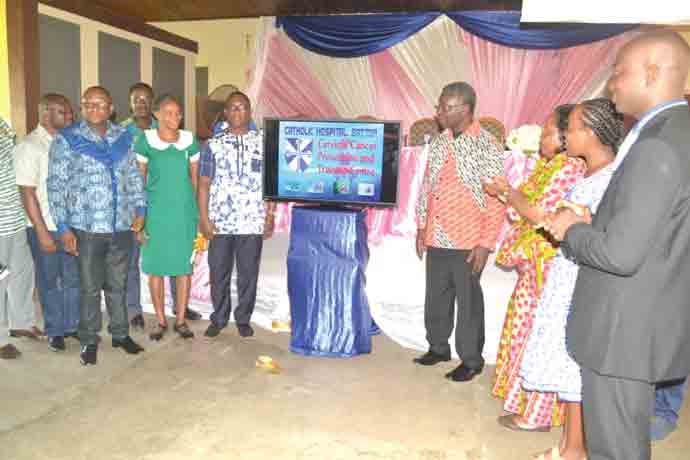 Professor Kwabena Frimpong-Boateng (4th right), the Minister of Environment, Science, Technology and Innovation, launching the three locally developed mobile applications software at Battor in the Volta Region last Friday