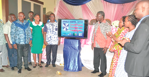 Professor Kwabena Frimpong-Boateng (4th right), the Minister of Environment, Science, Technology and Innovation, launching the three locally developed mobile applications software at Battor in the Volta Region last Friday