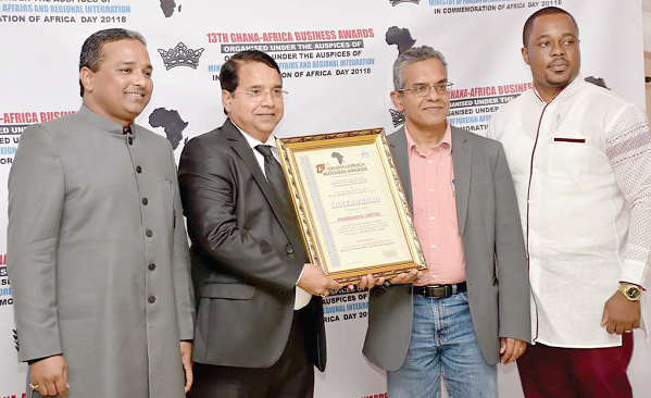  Mr Dhananjay Thripathi (2nd left), the Managing Director of Pharmanova Limited, and other staff members of the company displaying the award after the ceremony