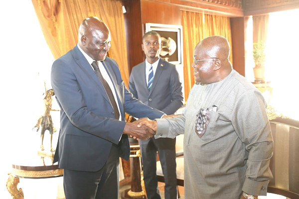 President Akufo-Addo welcoming Mr Aristides Gomez (left), Prime Minister of Guinea Bissau to the Jubilee House in Accra. 