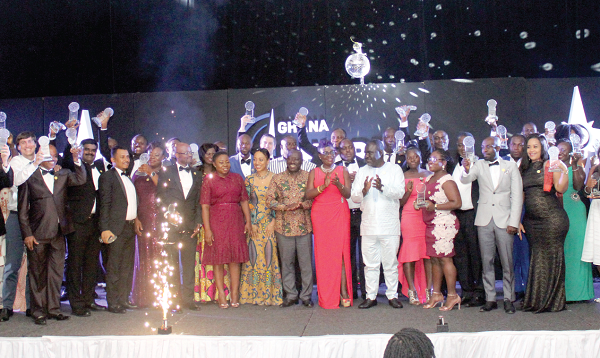 Mr Kwaku Ofori Asimah, Minister of Transport together with the award winners. 