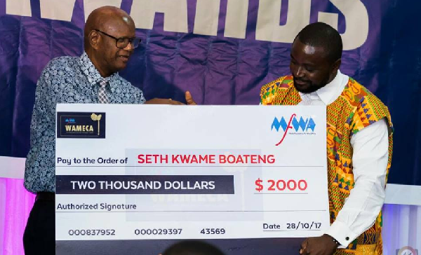 Seth Kwame Boateng receiving an award during the maiden edition.