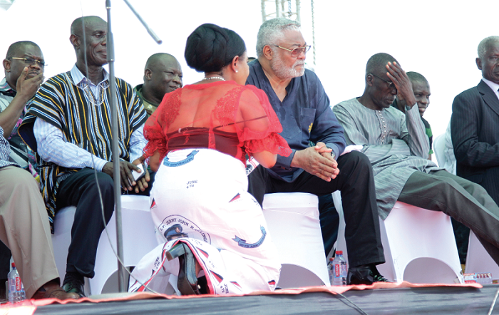 Ms Anita Desosoo, on her knees before Rawlings