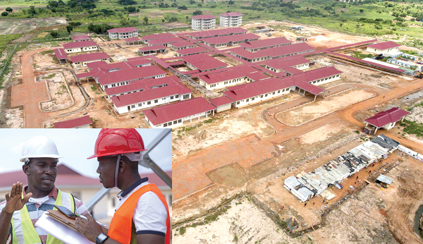  Aerial view of the Madina District Hospital at Kwabenya. Insert: A site Engineer, Mr Sydney Nii Adjei Sowah (left), briefing the Daily Graphic on progress made