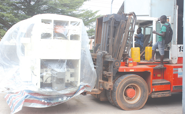 The new automated cylinder manufacturing production line being carried to the production room. Picture: BENEDICT OBUOBI