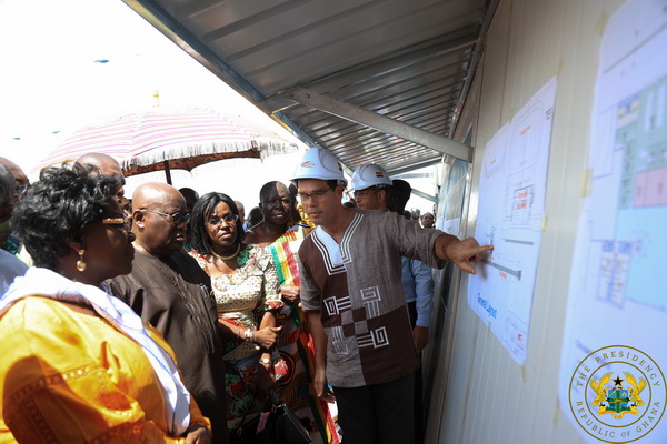 President Akufo-Addo being briefed by engineers on the site