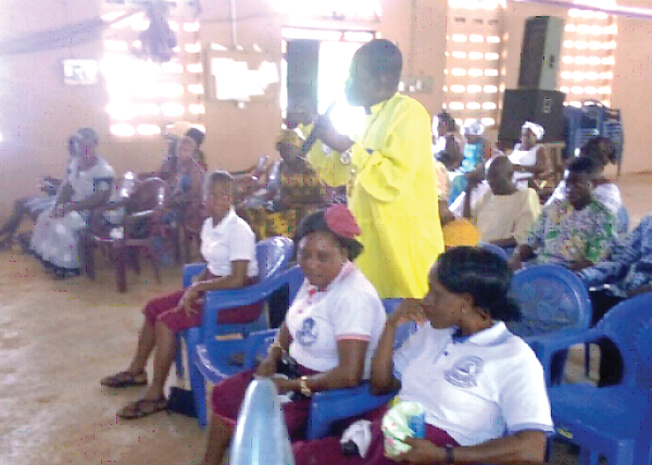 A participant seeks clarification during one of the Lower Manya NCCE public education 