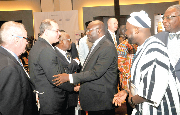 The Vice-President, Dr Mahamudu Bawumia, interacting with some participants after the opening session of the Ghana International Petroleum Conference in Accra. Among them are Mr Senyo Hosi (2nd right) CEO, Chamber of Bulk Oil Distributors, and Mr Boakye Agyarko (right), Minister of Energy. Picture: EBOW HANSON
