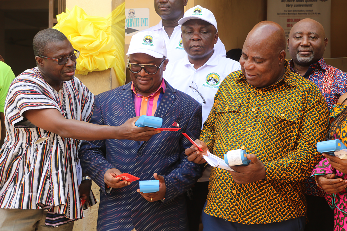 Dr Emmanuel Lamptey (middle) and Mr. Ishmael Ashitey inspecting the system