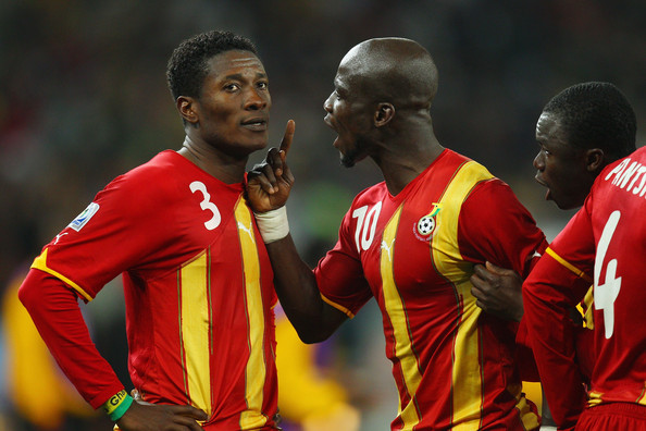A captain and his assistant: Stephen Appiah has some scolding for Asamoah Gyan during Ghana's near-historic encounter against Uruguay during South Africa 2010, our best year in the FIFA world ranking