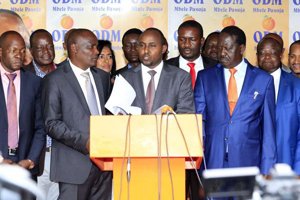 ODM's National Assembly Minority Whip Junet Mohamed, flanked by other members, addresses journalists at Orange House, Nairobi, on March 13, 2018. The ODM members have promised to work with Jubilee Party. 