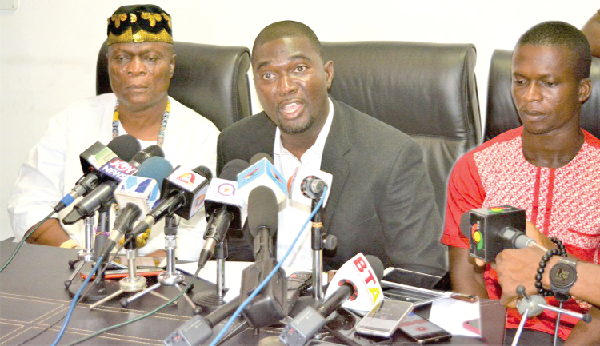 Mr Duncan Amoah (middle), flanked by Togbui Adaku IV, a member of the Council of COPEC, and Mr Yaw Barima (right), the Chairman of the True Drivers Union, at the press conference.