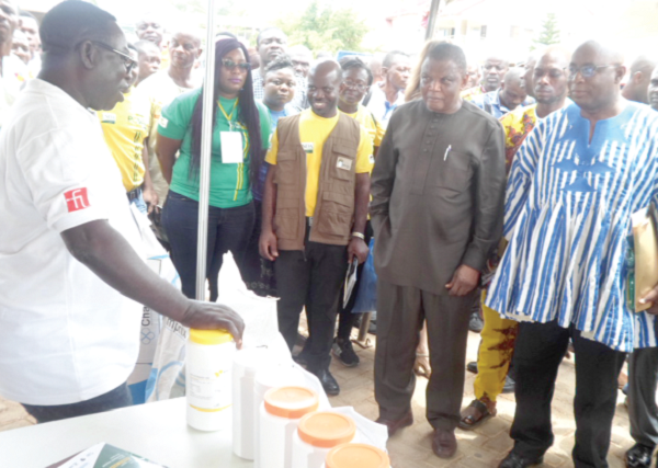 Dr Gyiele Nurah (2nd right) interacting with some of the exhibitors at the fair