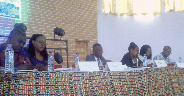  Justice Alan Brobbey (middle) and other commissioners at the hearing