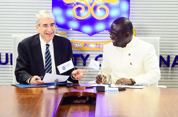 President Salovey &amp; Vice Chancellor Prof. Ebenezer Owusu sharing a  light moment at the signing 